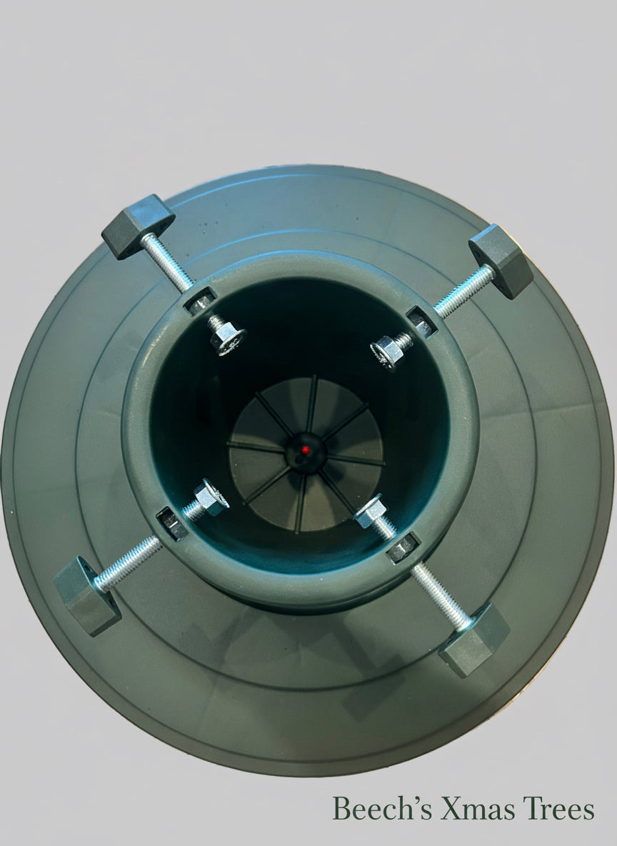 Birds Eye view of green plastic Christmas tree stand 