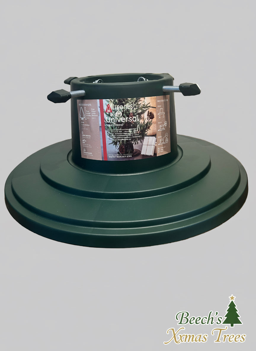 Green plastic Christmas tree stand with water well