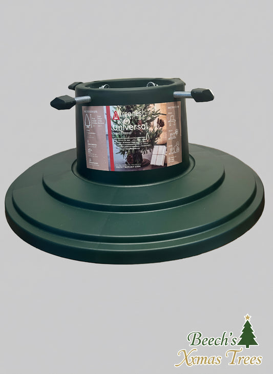 Green plastic Christmas tree stand with water well
